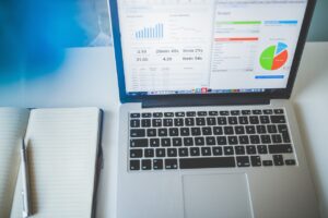 laptop with financials dashboard